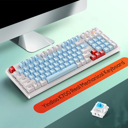 Yindao K700 Real Mechanical Keyboard with gradient keys on a green surface