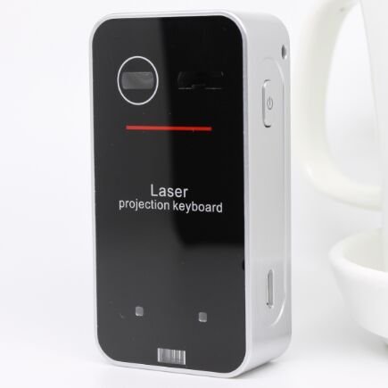 Laser projection keyboard device on a white background