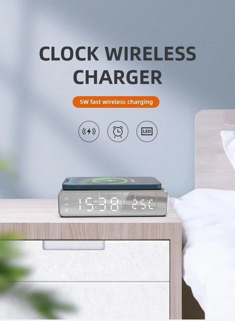 Wireless charger with clock on a nightstand next to a bed