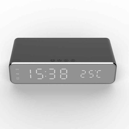 Digital clock with time and temperature display on a white background
