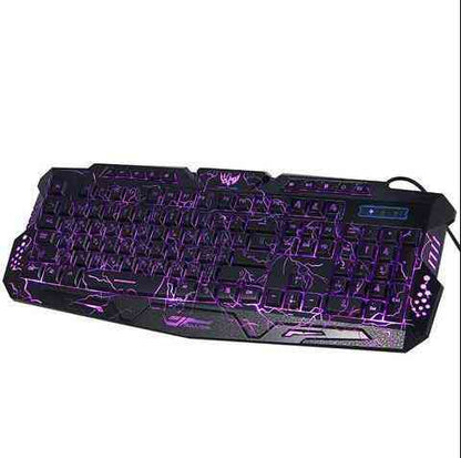 Gaming keyboard with purple backlighting on a white background