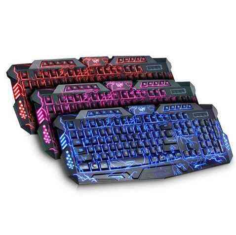 Three keyboards with different color schemes on a white background