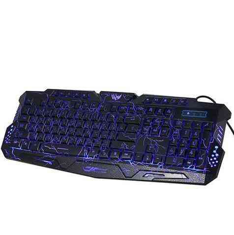 Gaming keyboard with blue backlighting on a white background