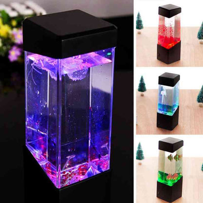 Small aquarium with colorful LED lights on a black base, shown from multiple angles.