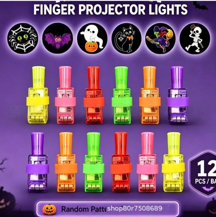 Twelve colorful finger projector lights arranged in two rows on a purple Halloween-themed background with spooky icons and text reading 'FINGER PROJECTOR LIGHTS' and '12 PCS / BA'.