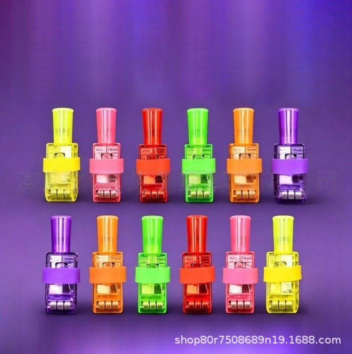 Twelve small colorful plastic clip-on highlighter pens arranged in two rows on a purple gradient background. The pens come in multiple colors including yellow, pink, red, green, orange, and purple, with clear plastic bodies showing the ink cartridge inside.
