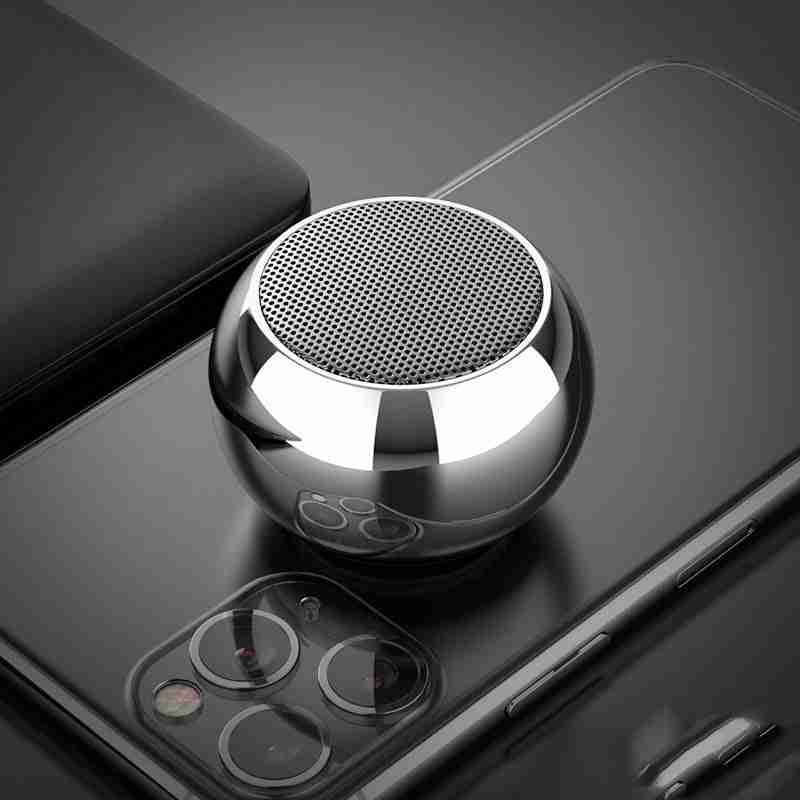 Metallic ball-shaped car mount on a smartphone