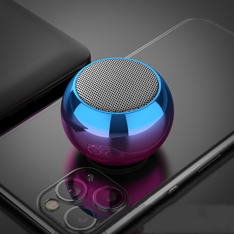 Blue and purple metallic speaker on a smartphone