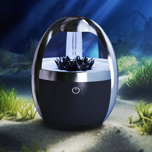 Underwater device with a light on a blue underwater background