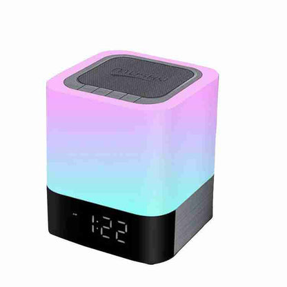 Colorful LED lamp with digital clock on a white background