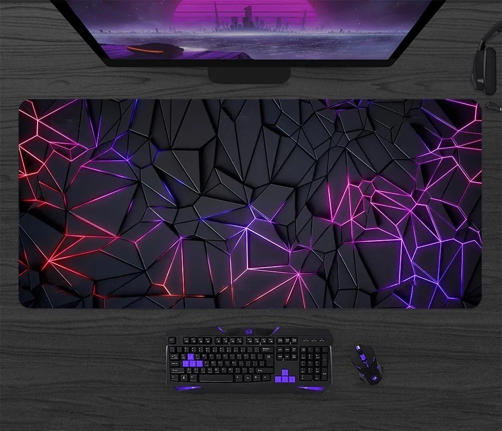 Gaming setup with a large mouse pad featuring geometric patterns, keyboard, and mouse on a wooden desk.