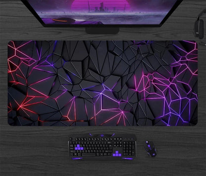 Gaming setup with a large mouse pad featuring geometric patterns, keyboard, and mouse on a wooden desk.