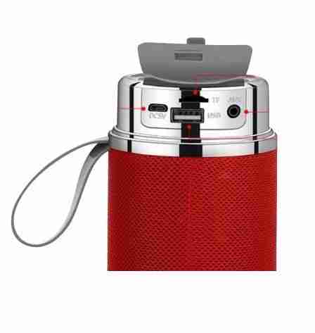 Red portable speaker with a silver top on a white background