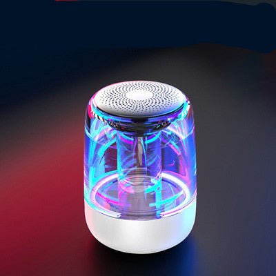 Colorful LED light-up speaker on a dark background