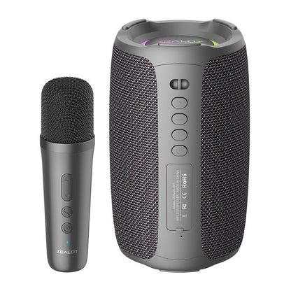 Gray portable speaker with microphone on a white background
