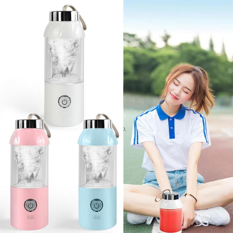 Three colorful portable blenders on a white background with a person holding a red blender outdoors.