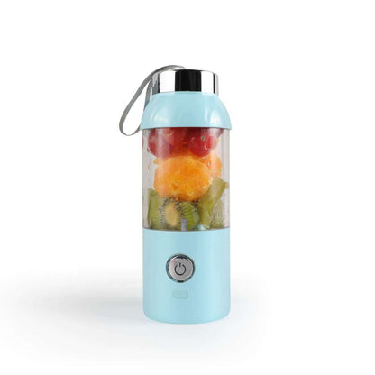 Portable blender with fruits inside on a white background