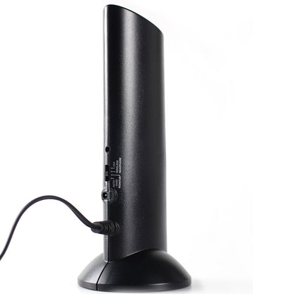 Black electronic device with a cable on a white background