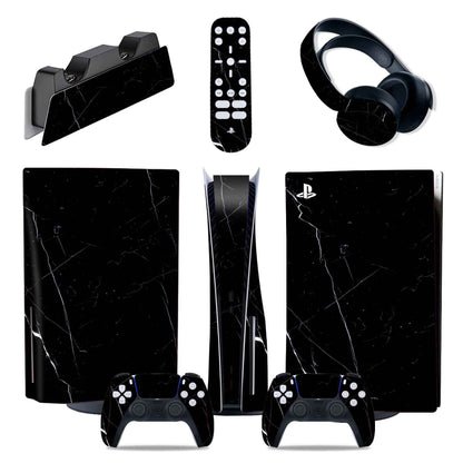 Gaming console and accessories with black marble design on a white background