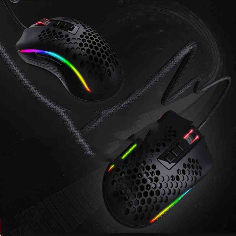 Gaming mouse with RGB lighting on a dark background