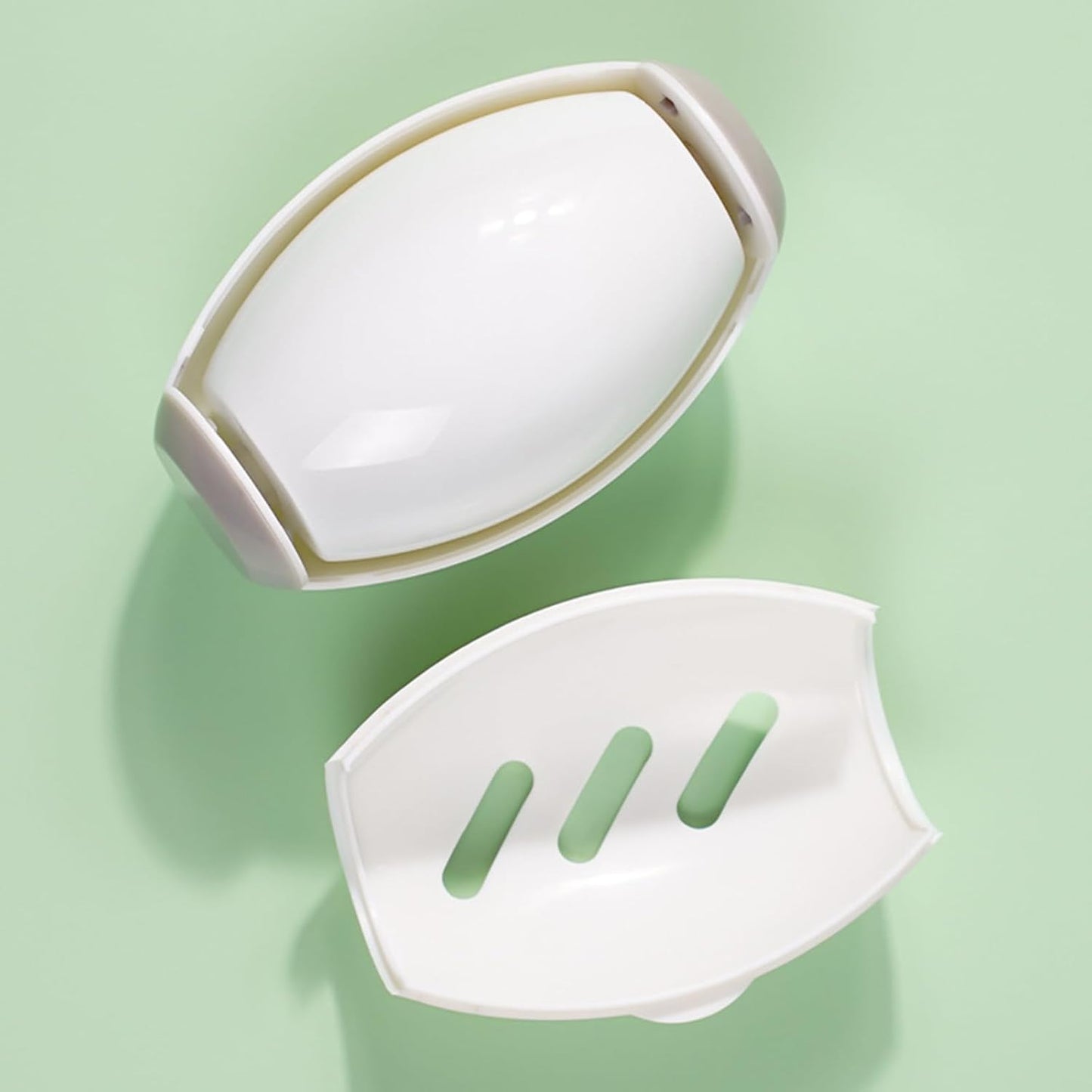white Lint Roller opened on a light green background