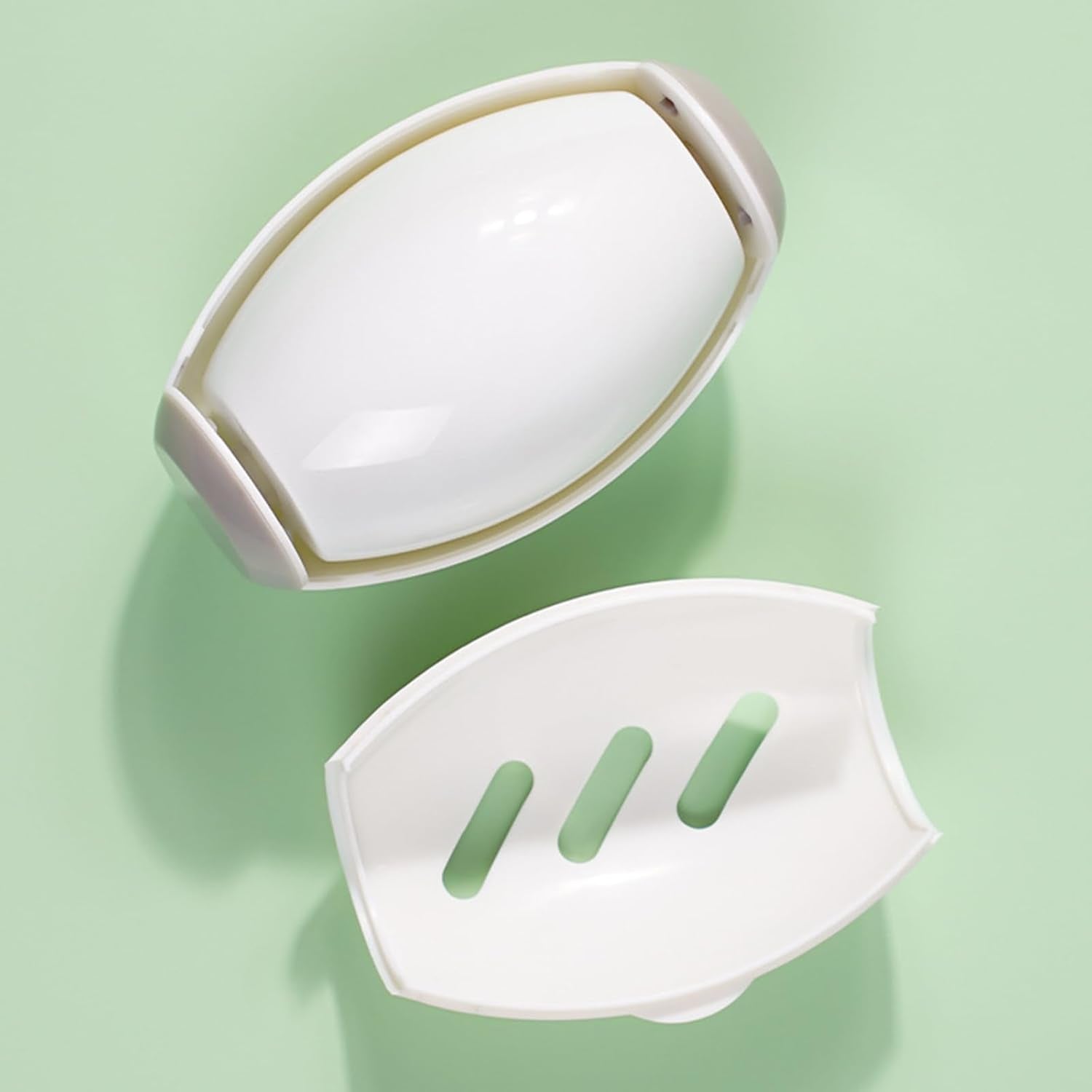 white Lint Roller opened on a light green background