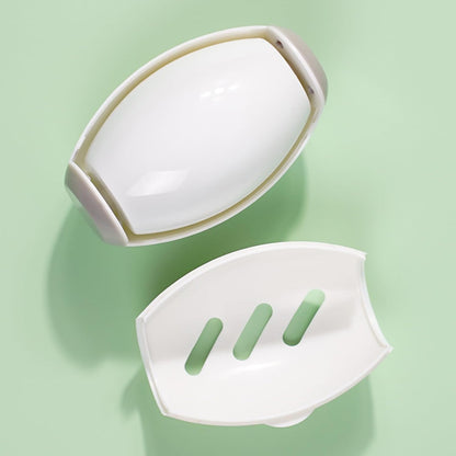 white Lint Roller opened on a light green background