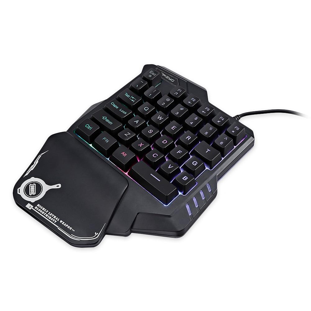 Single-handed gaming keyboard with RGB lighting on a white background
