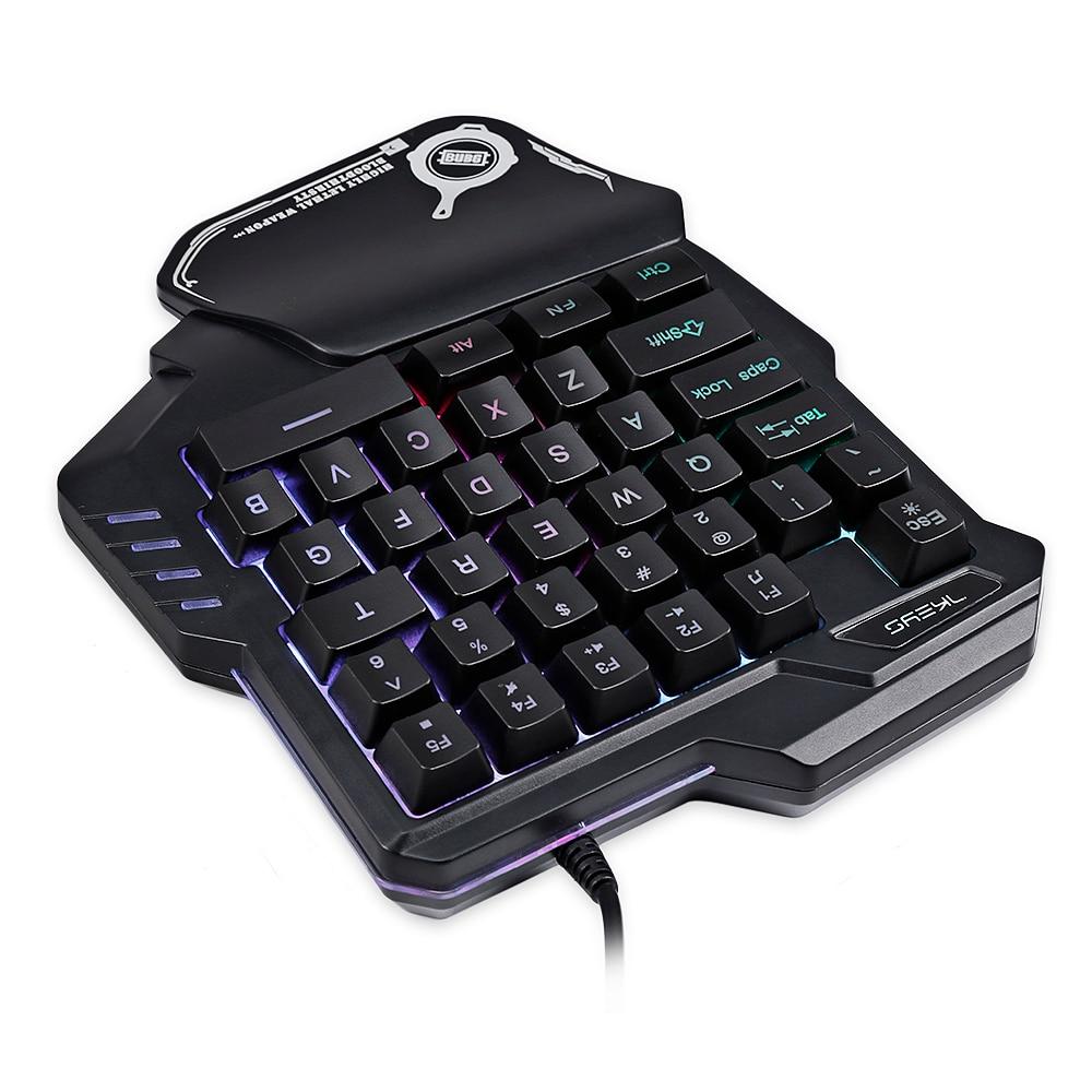 Black ergonomic keyboard with RGB lighting on a white background