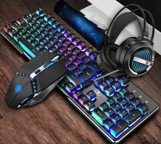 RGB gaming keyboard mouse headset on a wooden surface