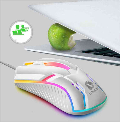 RGB Gaming Mouse with colorful lighting on a desk next to a laptop and apple