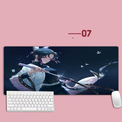 Anime character mouse pad with keyboard and mouse on a pink background
