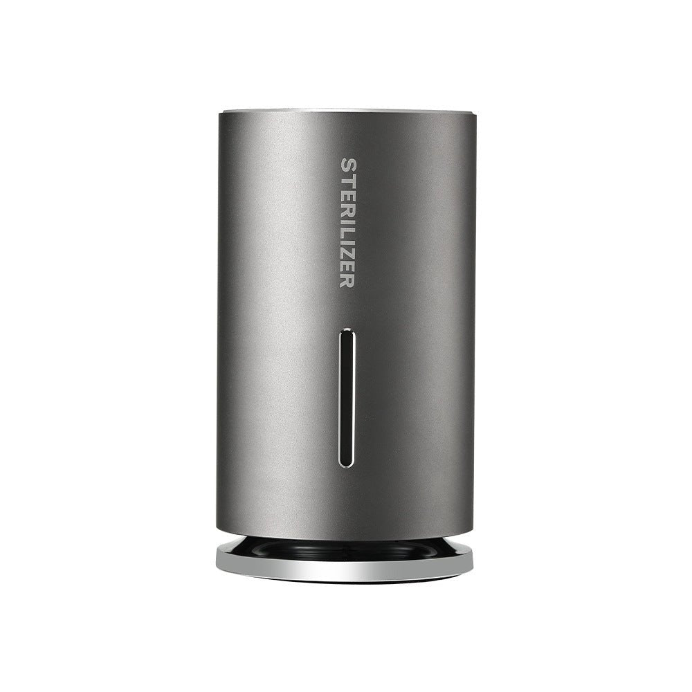 Gray cylindrical sterilizer on a white background