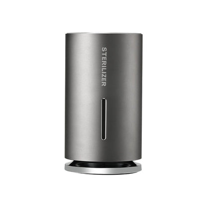 Gray cylindrical sterilizer on a white background