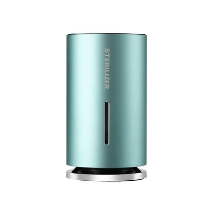 Blue cylindrical sterilizer on a white background