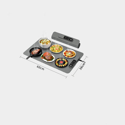Portable cooking stove with food on a white background