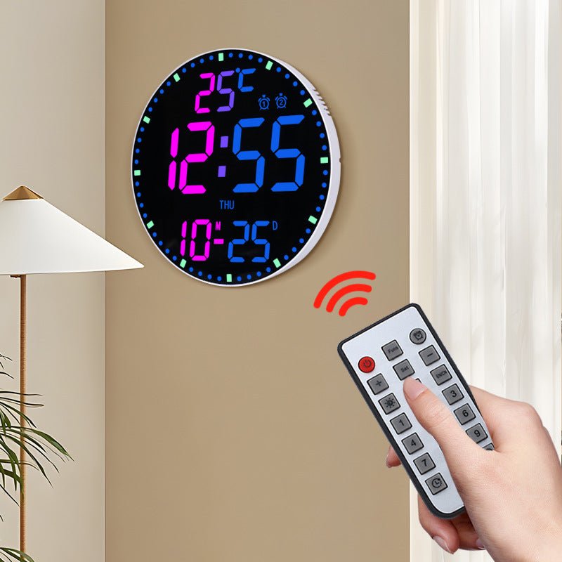 Digital wall clock with colorful display and remote control in a home setting