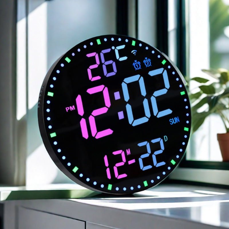 Digital clock with colorful display on a surface near a window