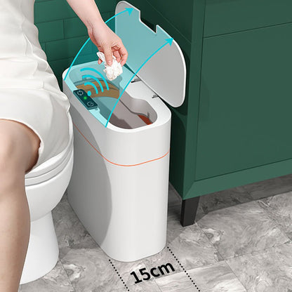 Hand using a cleaning tool on a white bidet in a bathroom setting.