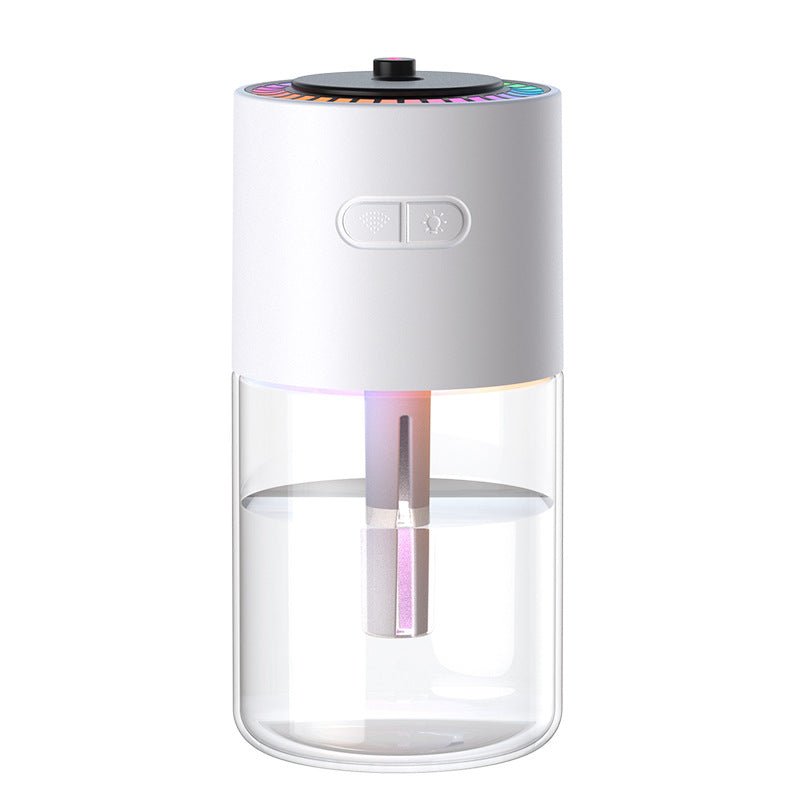White and clear glass humidifier with colorful light on a white background