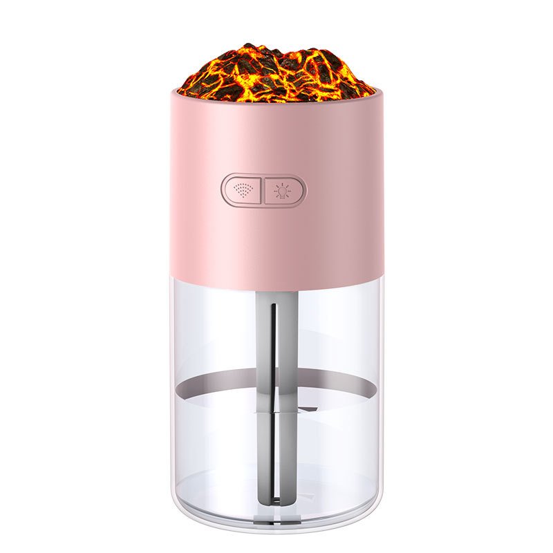 Pink and clear lamp with lava-like top on a white background
