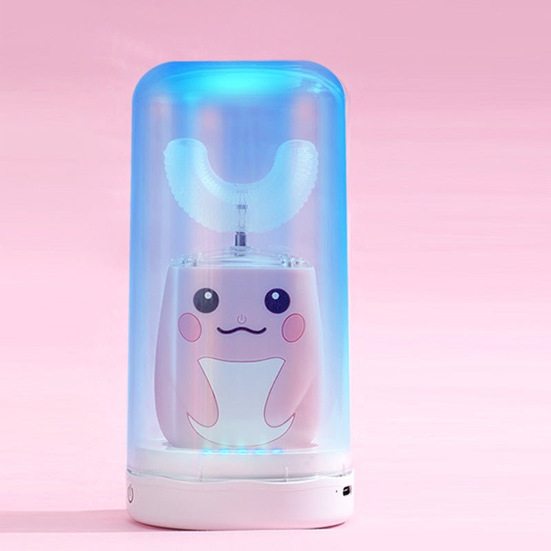 Cute cartoon shark-shaped night light with colorful glow on a pink background