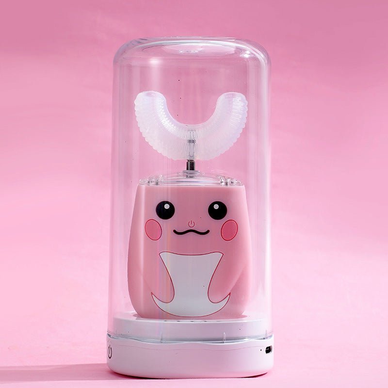Pink cartoon-like toothbrush holder with a clear lid on a pink background