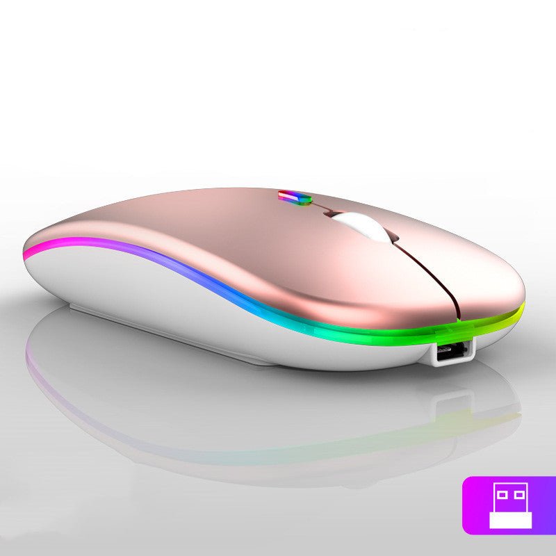 Rose gold computer mouse with colorful LED lights on a white background