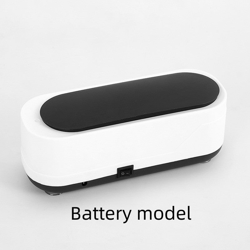 White and black vibration plate on a light gray background with 'Battery model' text.