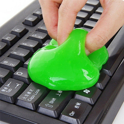 Green putty being used on a keyboard