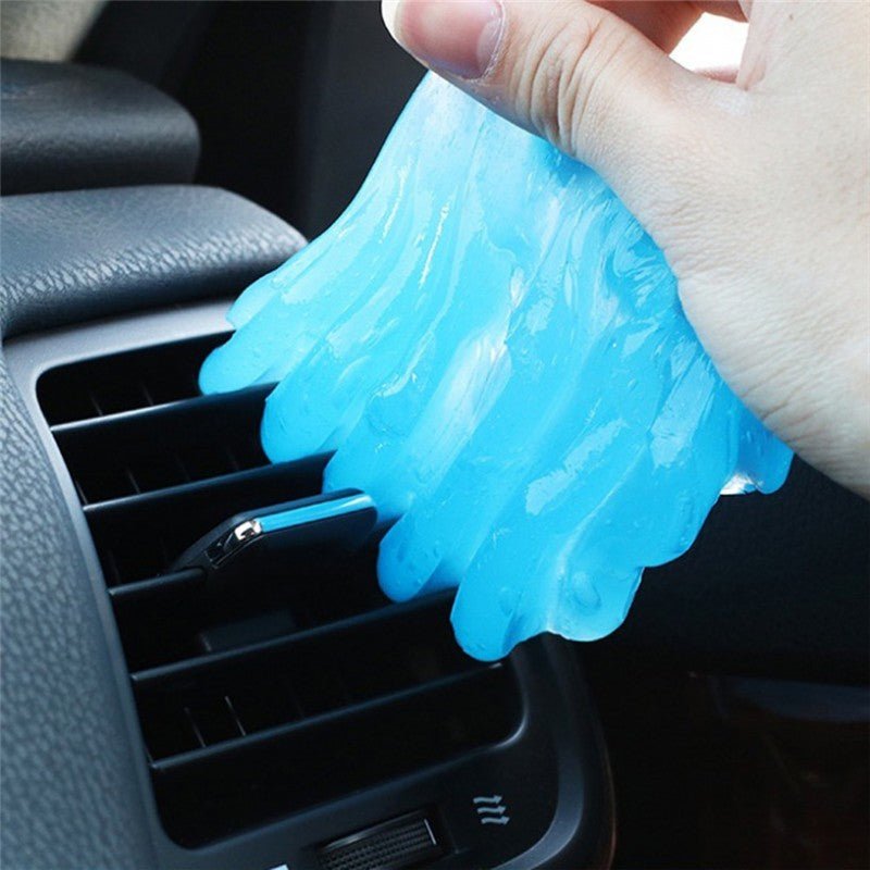 Blue gel pack being placed into a car air vent