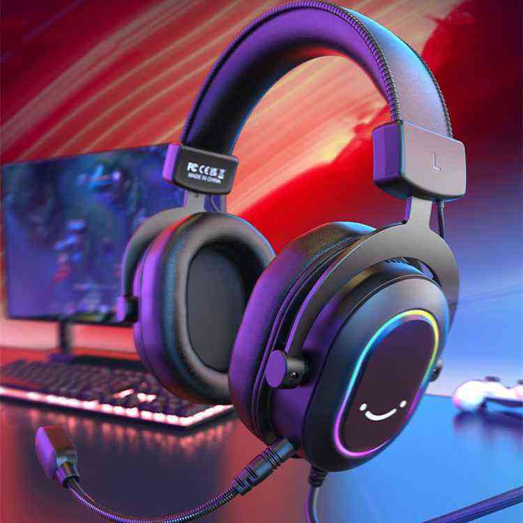 USB Gaming Headset with RGB lighting in front of a computer setup