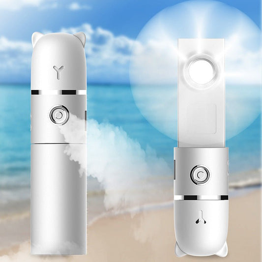 Two white devices with circular designs on a beach background
