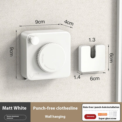 Matt White punch-free clothesline wall hanging with dimensions on a gray background